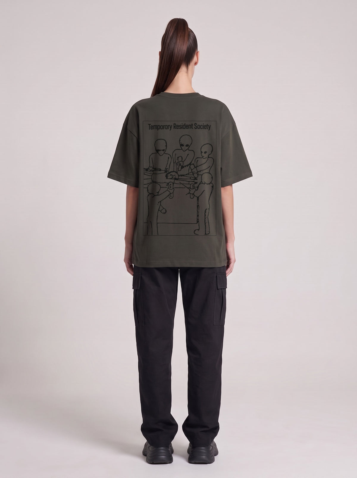 Temporary Resident Society — Drop Shoulder T-Shirt in Dark Gray, back, worn by female model