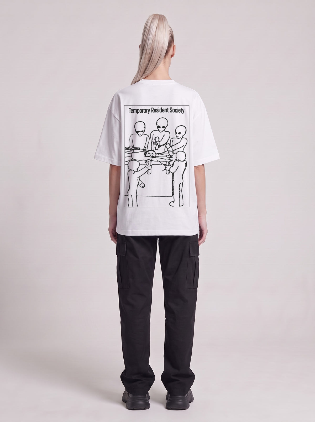 Temporary Resident Society — Drop Shoulder T-Shirt in Lucent White, back, worn by female model