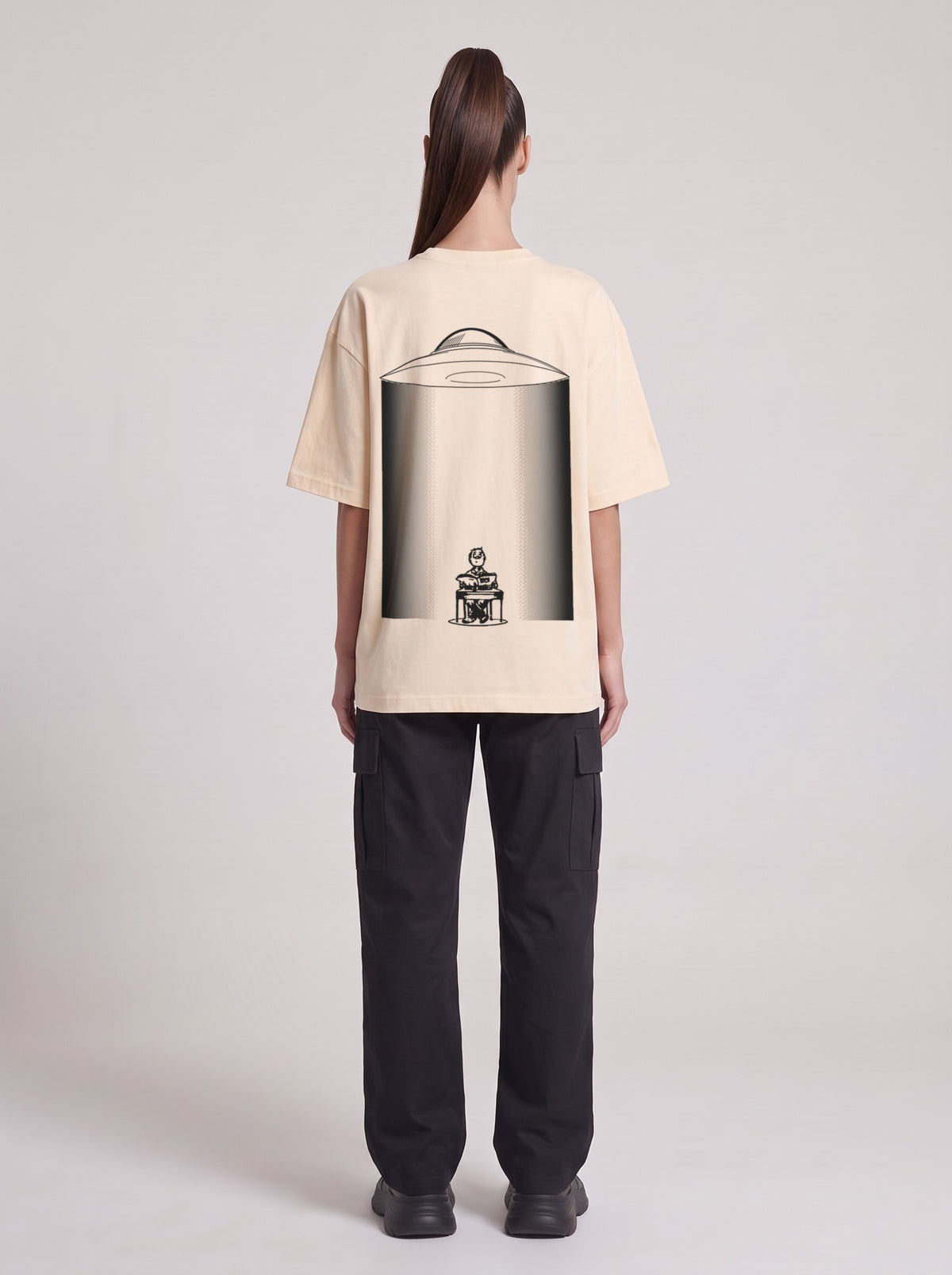 UFO-gatan — Drop Shoulder T-Shirt in Light Apricot, back, worn by female model