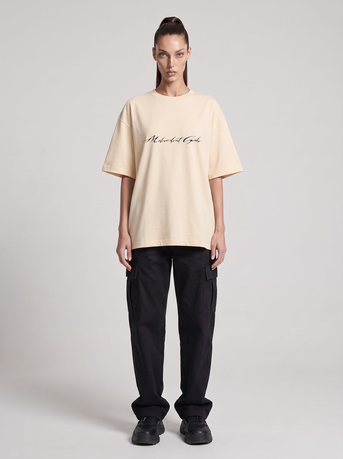 UFO-gatan — Drop Shoulder T-Shirt in Light Apricot, front, worn by female model
