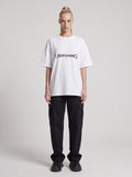 Understanding — Drop Shoulder T-Shirt in Lucent White, front, worn by female model